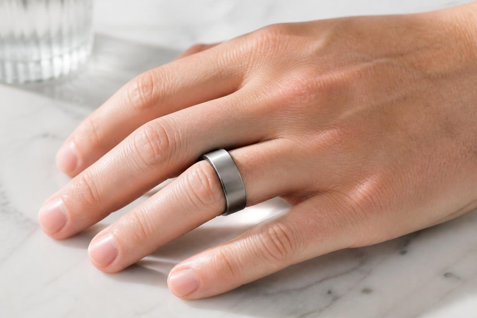 Oura Ring on finger — sleep and HRV tracking
